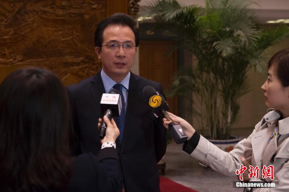 馬總理宣布MH370墜毀 在京乘客家屬泣不成聲 馬總理宣布MH370墜毀 在京乘客家屬泣不成聲